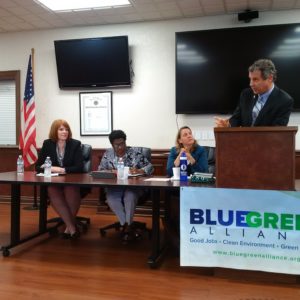 U.S. Senator Sherrod Brown (right) answers a question from audience at event in Cleveland on fair trade. 