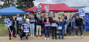 BlueGreen Alliance staff joins striking UAW workers on the picket line in Plymouth, MN. 